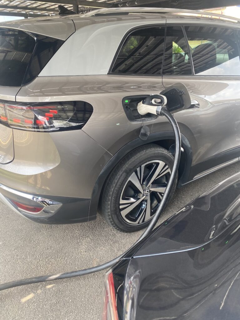 Electric SUV plugged in and charging in Abuja